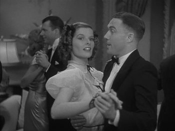 Movie still from “Alice Adams” (1935), directed by George Stevens – A man and a woman are dancing together; Medium shot, Low angle