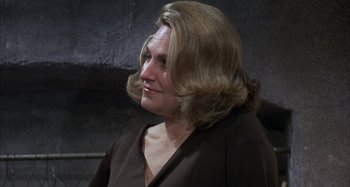 Movie still from “Alice's Restaurant” (1969), directed by Arthur Penn – A person with long hair; Close Up shot, Over the shoulder angle