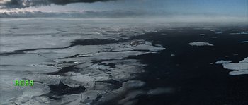 Movie still from “Alien vs. Predator” (2004), directed by Paul W.S. Anderson – An aerial view of a body of water; Extreme Wide shot, High angle