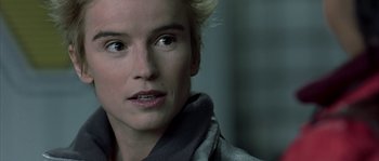 Movie still from “Alien vs. Predator” (2004), directed by Paul W.S. Anderson – A person with blonde hair; Close Up shot, Over the shoulder angle