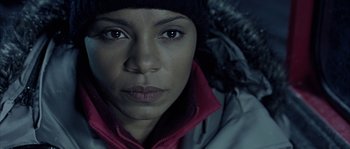 Movie still from “Alien vs. Predator” (2004), directed by Paul W.S. Anderson – A person wearing a jacket and a hat; Close Up shot, High angle