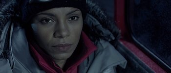 Movie still from “Alien vs. Predator” (2004), directed by Paul W.S. Anderson – A person wearing a jacket and a hat; Close Up shot, High angle