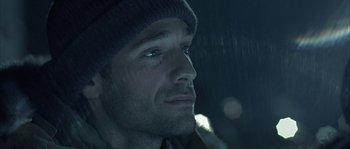 Movie still from “Alien vs. Predator” (2004), directed by Paul W.S. Anderson – A person wearing a hat; Close Up shot, Over the shoulder angle