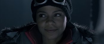 Movie still from “Alien vs. Predator” (2004), directed by Paul W.S. Anderson – A person wearing goggles and a hat; Close Up shot, Low angle