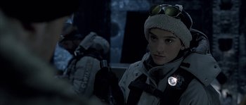 Movie still from “Alien vs. Predator” (2004), directed by Paul W.S. Anderson – A woman with a flashlight in her hand; Close Up shot, Over the shoulder angle