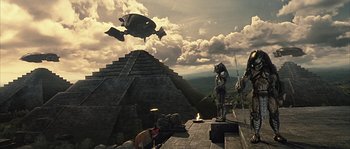 Movie still from “Alien vs. Predator” (2004), directed by Paul W.S. Anderson – An image of an ancient pyramid with a fish in the sky; Extreme Wide shot, Low angle