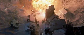 Movie still from “Alien vs. Predator” (2004), directed by Paul W.S. Anderson – An aerial view of an explosion in a city; Extreme Wide shot, High angle