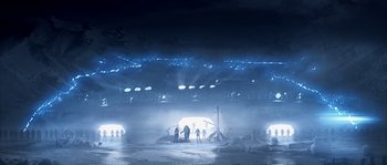 Movie still from “Alien vs. Predator” (2004), directed by Paul W.S. Anderson – A group of people standing in the middle of a field; Extreme Wide shot, High angle