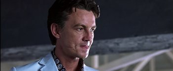 Movie still from “All About the Benjamins” (2002), directed by Kevin Bray – A person wearing a white shirt; Close Up shot, Low angle