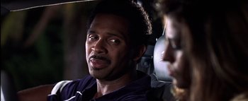 Movie still from “All About the Benjamins” (2002), directed by Kevin Bray – A person in a car; Close Up shot, Over the shoulder angle