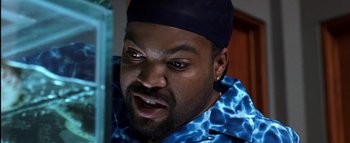 Movie still from “All About the Benjamins” (2002), directed by Kevin Bray – A person with a hat on; Close Up shot, Low angle