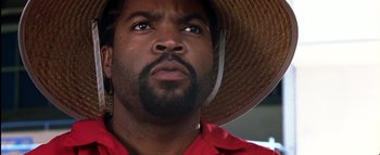 Movie still from “All About the Benjamins” (2002), directed by Kevin Bray – A person wearing a hat; Close Up shot, Low angle