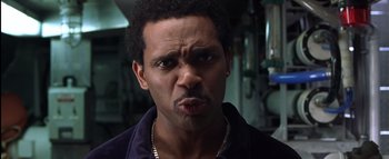 Movie still from “All About the Benjamins” (2002), directed by Kevin Bray – A person wearing a jacket; Close Up shot, Low angle