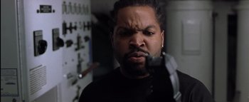 Movie still from “All About the Benjamins” (2002), directed by Kevin Bray – A person with a beard; Close Up shot, Low angle