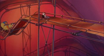 Movie still from “All Dogs Go to Heaven” (1989), directed by Dan Kuenster – A painting of a person sitting on top of a wooden bridge; Extreme Wide shot, Low angle