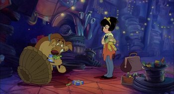 Movie still from “All Dogs Go to Heaven” (1989), directed by Dan Kuenster – A woman standing next to a man in a room; Wide shot, High angle