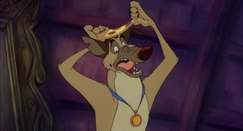 Movie still from “All Dogs Go to Heaven” (1989), directed by Dan Kuenster – A dog holding a piece of pizza in its mouth; Close Up shot, High angle