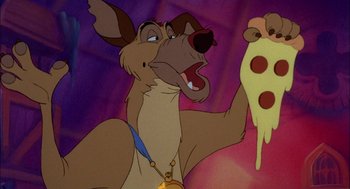 Movie still from “All Dogs Go to Heaven” (1989), directed by Dan Kuenster – A dog holding a slice of pizza; Close Up shot, Over the shoulder angle