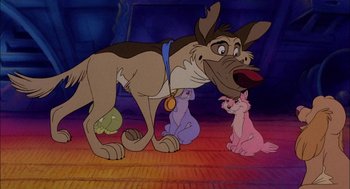 Movie still from “All Dogs Go to Heaven” (1989), directed by Dan Kuenster – A dog and two cats are sitting on the floor; Wide shot, High angle