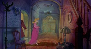 Movie still from “All Dogs Go to Heaven” (1989), directed by Dan Kuenster – A woman in a pink dress walking through a hallway; Wide shot, High angle