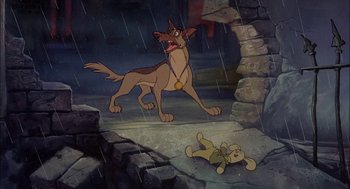 Movie still from “All Dogs Go to Heaven” (1989), directed by Dan Kuenster – A dog is walking in the rain near a child; Wide shot, High angle
