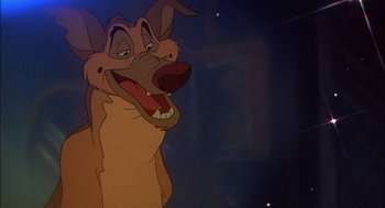 Movie still from “All Dogs Go to Heaven” (1989), directed by Dan Kuenster – A cartoon dog with its mouth wide open; Close Up shot, High angle