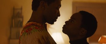 A man and a woman looking at each other