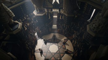 Movie still from “Game of Thrones” (2011), created by D.B. Weiss – A group of people standing in a circle around a star; Extreme Wide shot, Overhead angle