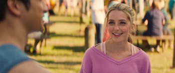 Movie still from “All My Life” (2020), directed by Marc Meyers – A beautiful young lady wearing a pink sweater; Close Up shot, Over the shoulder angle