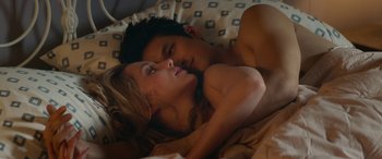 Movie still from “All My Life” (2020), directed by Marc Meyers – A man and a woman laying in a bed together; Close Up shot, Overhead angle