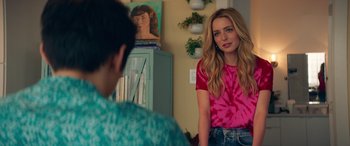Movie still from “All My Life” (2020), directed by Marc Meyers – A woman standing next to another woman in a living room; Medium shot, Over the shoulder angle
