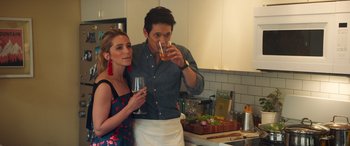 Movie still from “All My Life” (2020), directed by Marc Meyers – A man and a woman standing in a kitchen; Medium shot, Over the shoulder angle