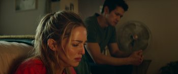 Movie still from “All My Life” (2020), directed by Marc Meyers – A woman sitting in front of a man in front of a computer; Close Up shot, Over the shoulder angle