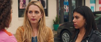 Movie still from “All My Life” (2020), directed by Marc Meyers – A woman sitting on the side of the street in front of a car; Close Up shot, Over the shoulder angle