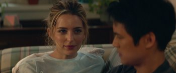 Movie still from “All My Life” (2020), directed by Marc Meyers – A woman sitting next to a man on a couch; Close Up shot, Over the shoulder angle