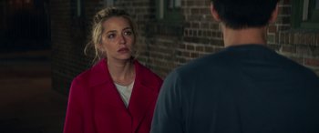 Movie still from “All My Life” (2020), directed by Marc Meyers – A woman wearing a red coat is looking at a man; Close Up shot, Over the shoulder angle