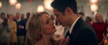 Movie still from “All My Life” (2020), directed by Marc Meyers – A man and a woman in formal wear looking at each other; Close Up shot, Over the shoulder angle