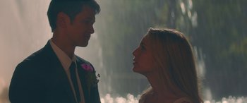 Movie still from “All My Life” (2020), directed by Marc Meyers – A man and a woman face to face in front of a waterfall; Close Up shot, Over the shoulder angle