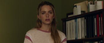 Movie still from “All My Life” (2020), directed by Marc Meyers – A woman with long blonde hair wearing a pink and white t - shirt; Close Up shot, Over the shoulder angle