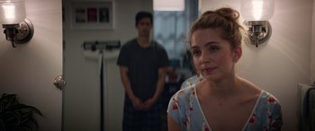 Movie still from “All My Life” (2020), directed by Marc Meyers – A young woman standing in front of a man in front of a mirror; Close Up shot, Over the shoulder angle