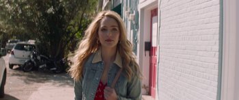 Movie still from “All My Life” (2020), directed by Marc Meyers – A woman with long blonde hair wearing a jean jacket; Close Up shot, Over the shoulder angle