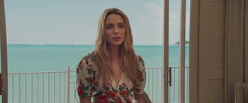 Movie still from “All My Life” (2020), directed by Marc Meyers – A woman standing on a balcony with a view of the ocean; Close Up shot, Over the shoulder angle