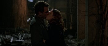 Movie still from “All the Real Girls” (2003), directed by David Gordon Green – A man and a woman kissing each other in the dark; Close Up shot, Low angle