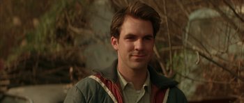 Movie still from “All the Real Girls” (2003), directed by David Gordon Green – A person wearing a jacket; Close Up shot, Over the shoulder angle