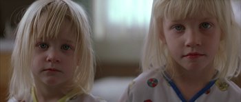 Movie still from “All the Real Girls” (2003), directed by David Gordon Green – Two little girls with blonde hair and blue eyes; Close Up shot, Low angle