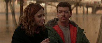 Movie still from “All the Real Girls” (2003), directed by David Gordon Green – A man and a woman standing next to each other; Close Up shot, Over the shoulder angle