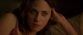 Movie still from “All the Real Girls” (2003), directed by David Gordon Green – A woman's face with green eyes; Close Up shot, High angle