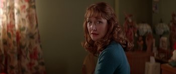 Movie still from “All the Real Girls” (2003), directed by David Gordon Green – A person with long red hair; Close Up shot, Over the shoulder angle