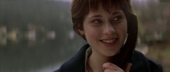 Movie still from “All the Real Girls” (2003), directed by David Gordon Green – A person with short brown hair; Close Up shot, Over the shoulder angle