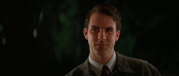 Movie still from “All the Real Girls” (2003), directed by David Gordon Green – A person wearing a suit and tie; Close Up shot, Low angle